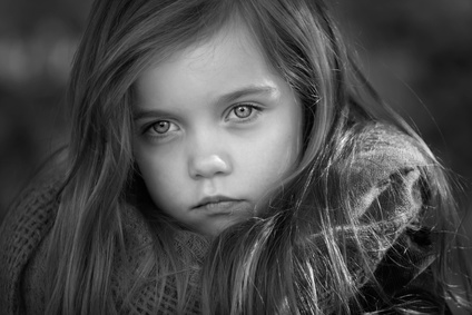 black and white portrait of a beautiful young girl with long hair taken outside